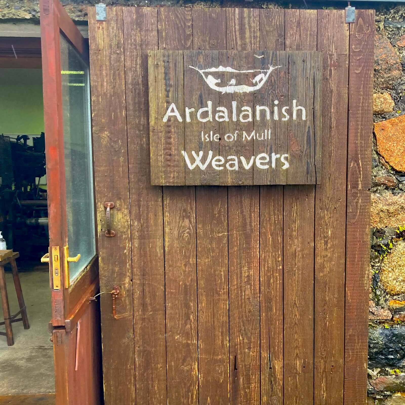 The hand-painted sign for Ardalanish Isle of Mull Weavers, a working wool mill.